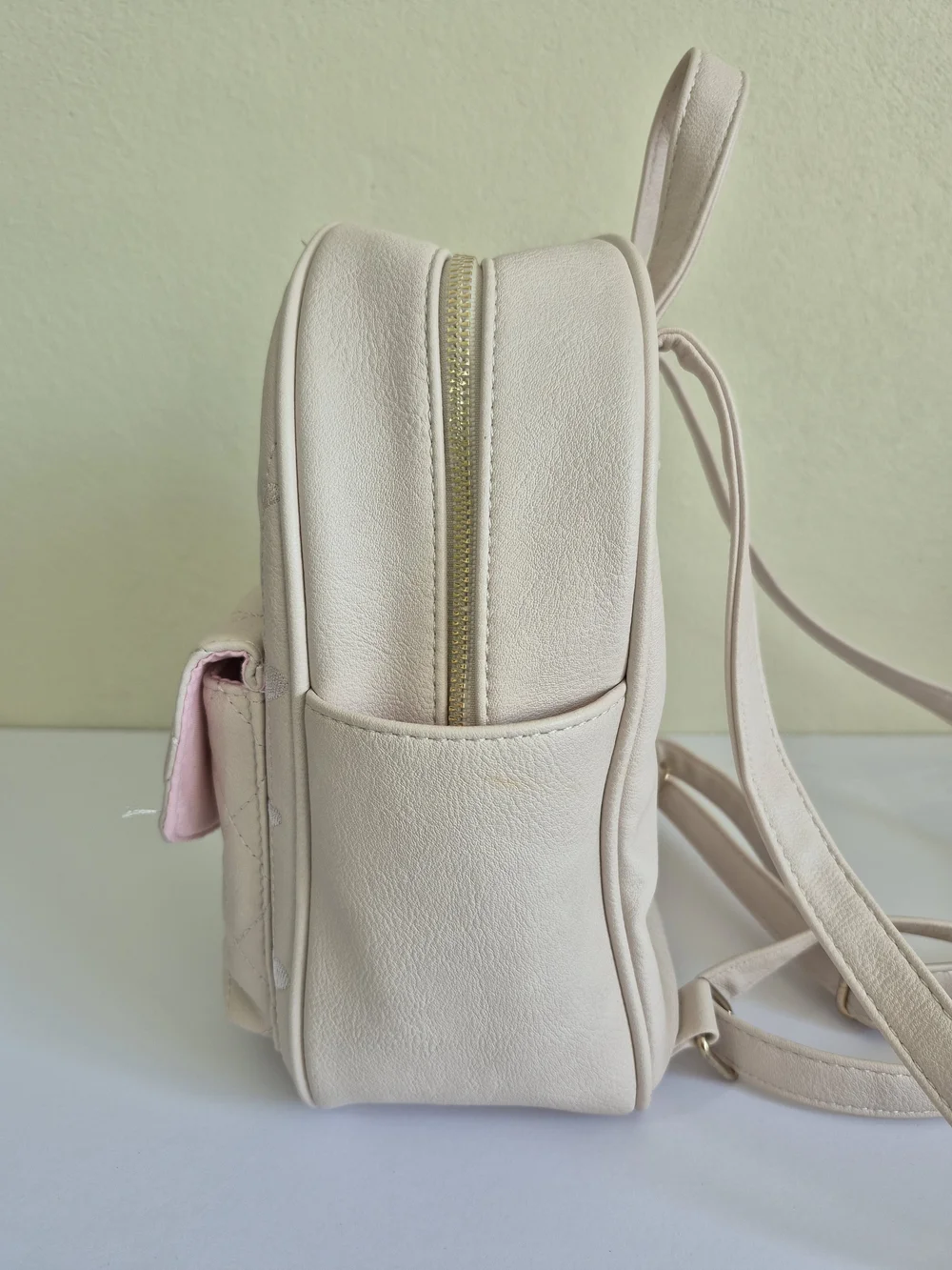 Under One Sky Cream Quilted Backpack with Gold Heart Lock